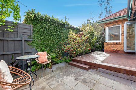 Family home located in the McKinnon School Zone! - Photo 2