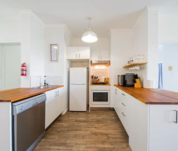 Coastal Living at Its Finest - Stunning 2-Bedroom Fully Furnished T... - Photo 2