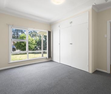 SPACIOUS 3-BEDROOM HOME with HUGE YARD and REAR STREET ACCESS - Photo 1