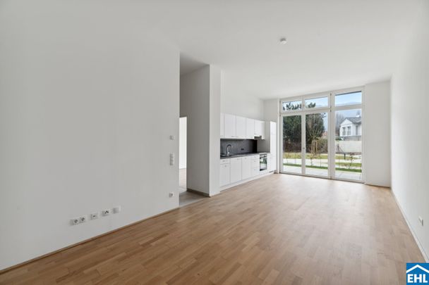 Moderne 2-Zimmer-Wohnung mit Eigengarten und Terrasse! - Foto 1