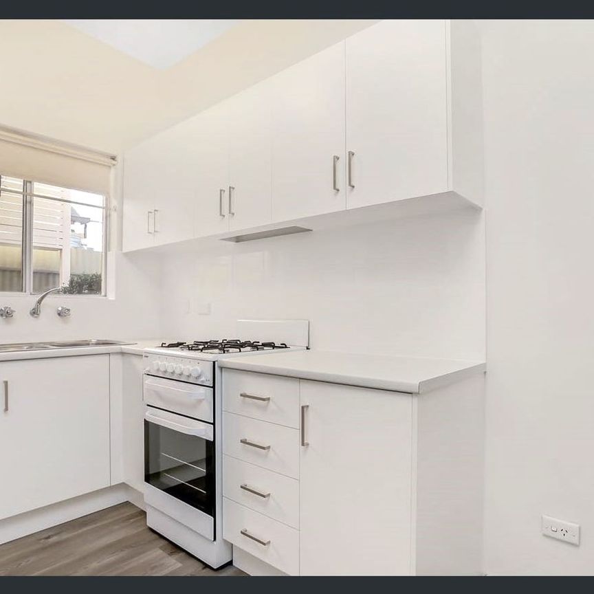 Prime Location! Step into Comfort and Style with This Beautifully Presented 2 Bedroom Unit! - Photo 1