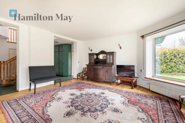 Nietuzinkowy dom na wynajem z przestronnym i zadbanym ogrodem na Woli Justowskiej - Zdjęcie 1