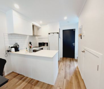 Stylish 2-Bedroom Home with Modern Comforts & Private Outdoor Spaces - Photo 5
