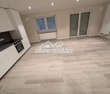 Erstbezug! Stilvolle 2-Zi KfW Neubauwohnung in Toplage von Rüdeshei... - Foto 1