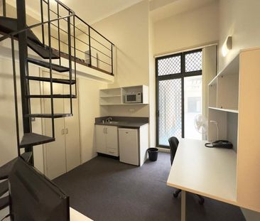 Loft style unit with portable ac - Photo 5