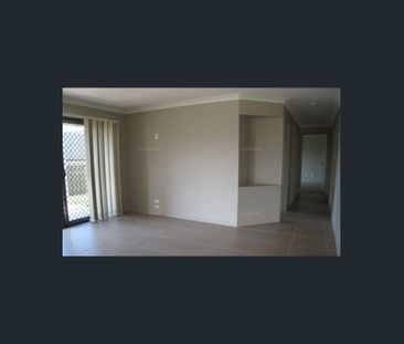 BEAUTIFUL FAMILY HOME IN THE HEART OF REDBANK PLAINS - Photo 5