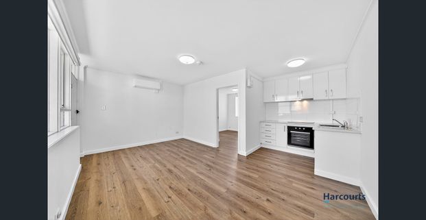 Stylish One-Bedroom Apartment in Prime Location - Photo 1