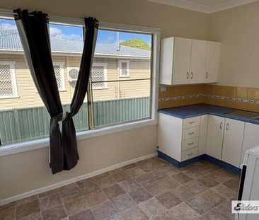 Long-Term 2-Bedroom Rental with Secure Fenced Yard - Photo 1