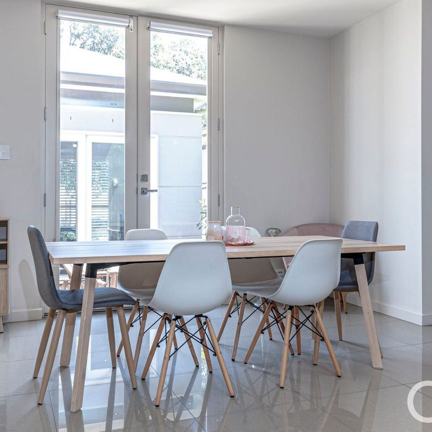 Open the Door to Spacious Family Living in Kensington's Prime Location - Photo 1