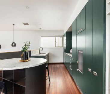 A Sophisticated Retreat with Courtyard & Garage - Photo 2