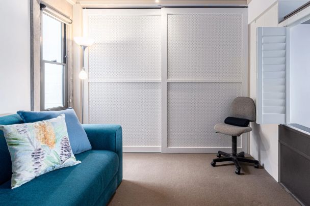 Stunning split-level apartment with views and parking and storage cage - Photo 1