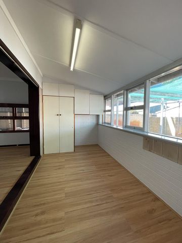 Freshly Updated Home with Spacious Living and Ideal Location! - Photo 4
