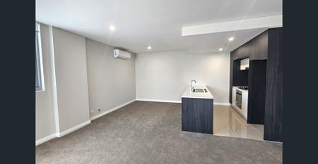 Spacious & Light Filled 3 Bedroom Apartment in Prime Baulkham Hills Location - Photo 3