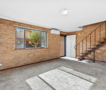 Easy-care & affordable living between lake and surf - Photo 4