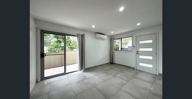 Modern Near-New Granny Flat with Spacious Yard & Private Entry - Photo 1