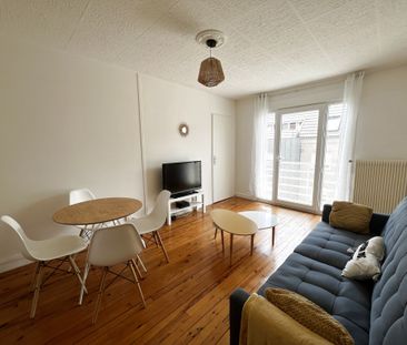 Location Appartement 4 pièces 63m² ST ETIENNE 42000 - Photo 2