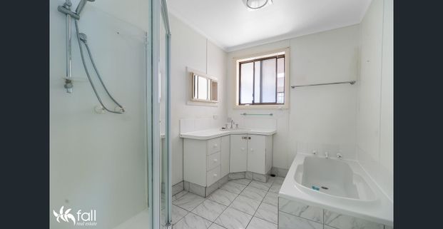 Spacious Family Home with Stunning Water Views & Flexible Living Options - Photo 1