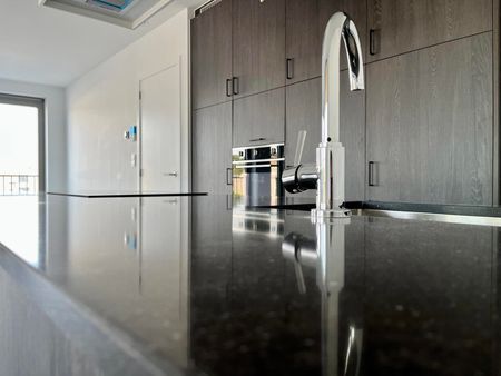 Energiezuinig app met 3 slaapkamers en ondergrondse autostaanplaats - Photo 3