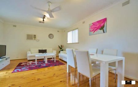 “Welcome to this spacious and secure courtyard homette near the CBD located at the rear of a small group of four.” - Photo 4