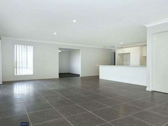 Modern 4 Bedroom Family Home with a Great Yard. - Photo 1