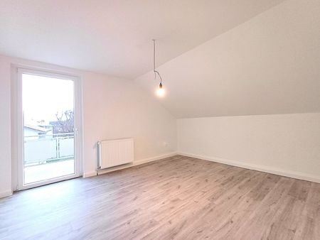 Dachgeschosswohnung in gepflegtem Wohnhaus - Photo 5