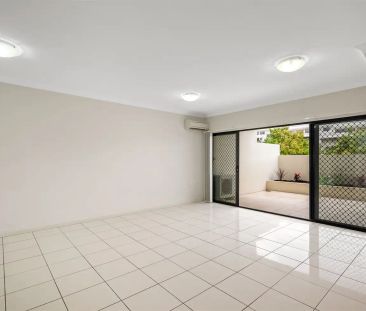 “Suave Villa-Style Townhouse” - Photo 3