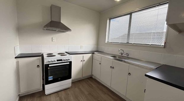 Recently Renovated 3-Bedroom Home with Big Section & Open Garage - Photo 1