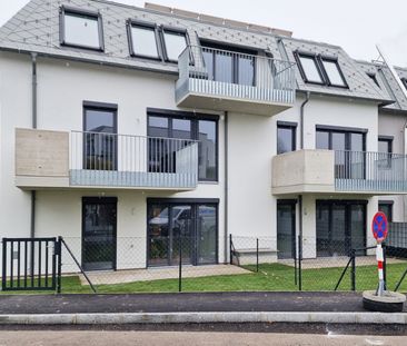 Erdgeschoßwohnung mit Terrasse und Garten - Foto 1