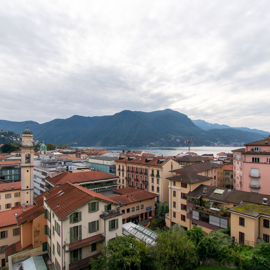 4.5 LOCALI DUPLEX IN CENTRO CITTÀ CON VISTA LAGO - Photo 1