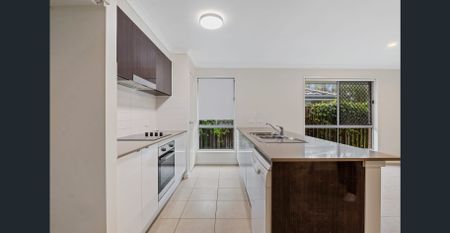 Freshly Updated 4-Bedroom Family Home in Prime Pimpama Location - Photo 4