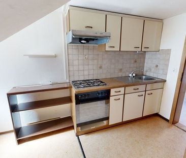 Dachwohnung an zentraler Lage - Photo 3