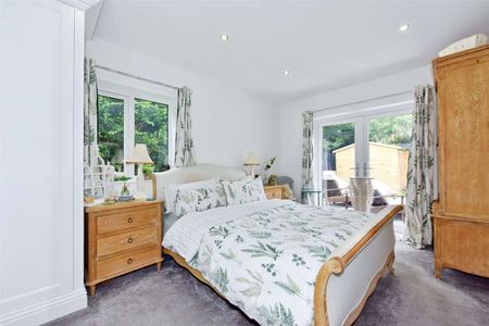 A beautifully updated four bedroom detached home, located on the Abbotsbrook Estate. - Photo 5