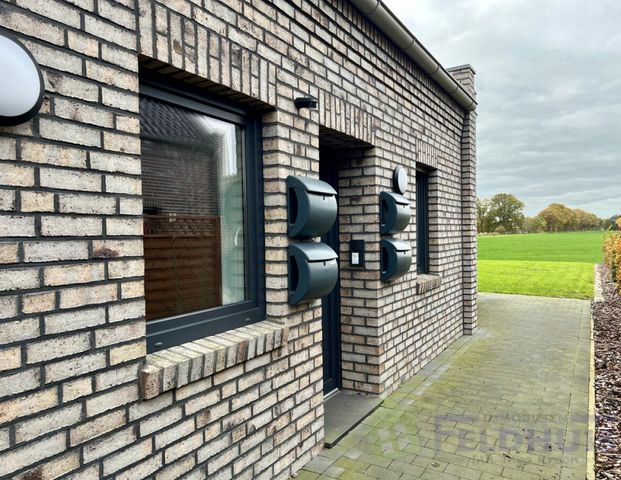 Wohnen in einer gemütlichen und modernen Oberwohnung in Veenhusen! - Foto 1