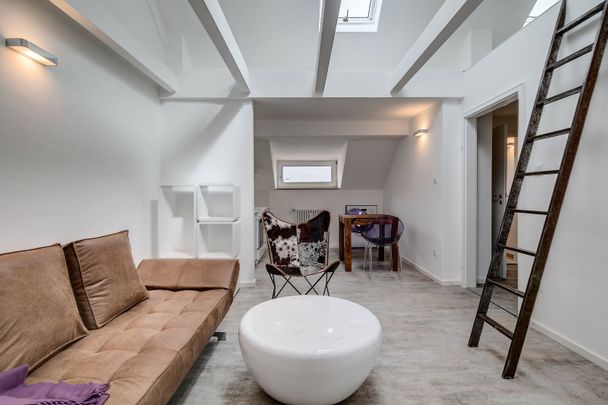 Gorgeous, modern attic apartment - Photo 1