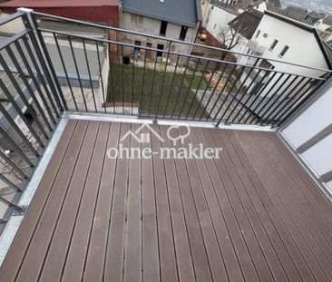 Erstbezug! Stilvolle 2-Zi KfW Neubauwohnung in Toplage von Rüdeshei... - Foto 2