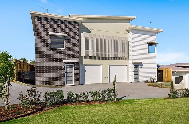 Hamptons-Style Split-Level Unit with Views! - Photo 1