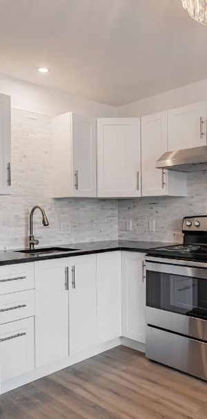 3 1/2 semi-meublé près centre d'achat et autoroute 20 - Photo 1