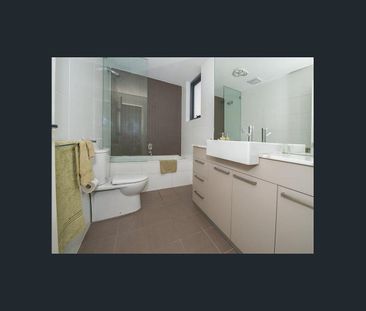 North Facing, Sun Filled, Two Level Townhouse - Photo 3