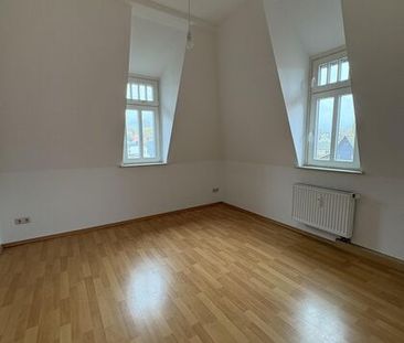 Gemütliche 2-Zimmer-Dachgeschosswohnung - Foto 1