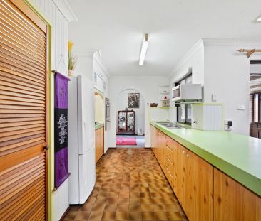 Spacious Coastal Home with Vaulted Ceilings and Drive-Through Garage - Photo 4