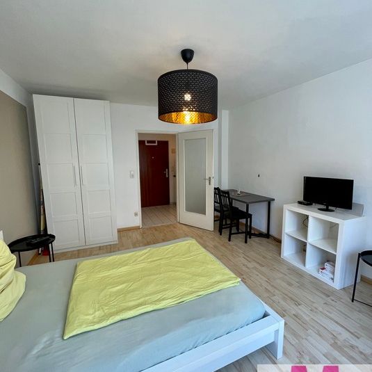 Modern möblierte 1-Zimmer-Wohnung im Zentrum - Foto 1