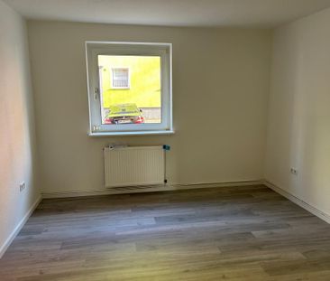 renovated 2-room apartment on the first floor - Photo 1