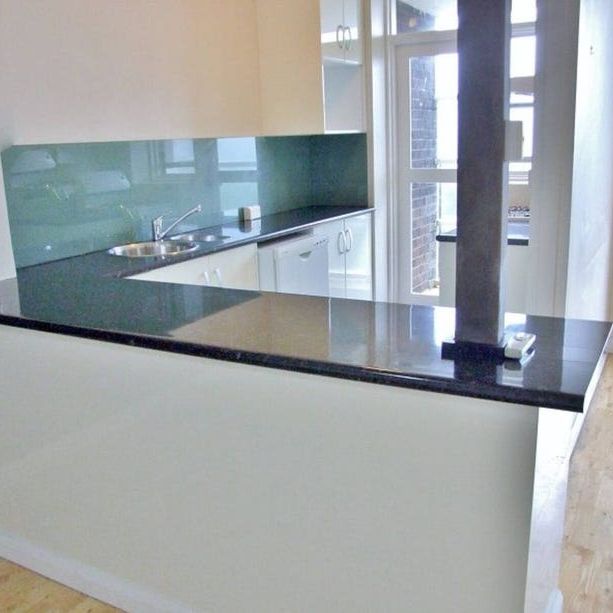 Top Floor with Views! - Photo 1