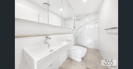 LARGE APARTMENT IN BURWOOD'S LIFESTYLE + TRANSPORT HUB - Photo 2