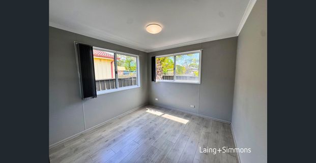 Comfortable two-bedroom granny flat with water usage included - Photo 1