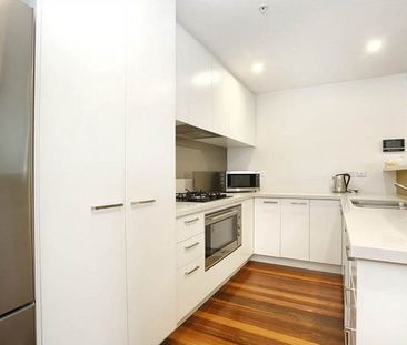 FURNISHED OVERSIZED TWO BEDROOM APARTMENT IN GREAT LOCATION - Photo 1