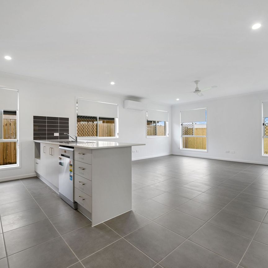 Spacious and Modern Living: 4-Bedroom Family Home with Double Garage. - Photo 1