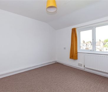 Top floor studio apartment overlooking the garden in this popular E... - Photo 1