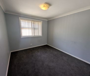 Comfortable Family Living with Entertainer's Appeal - Photo 3