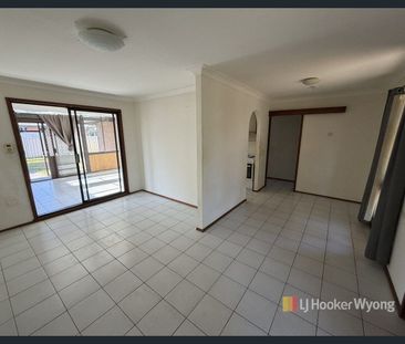 Charming Three-Bedroom Home with Multiple Living Areas & Large Alfr... - Photo 1